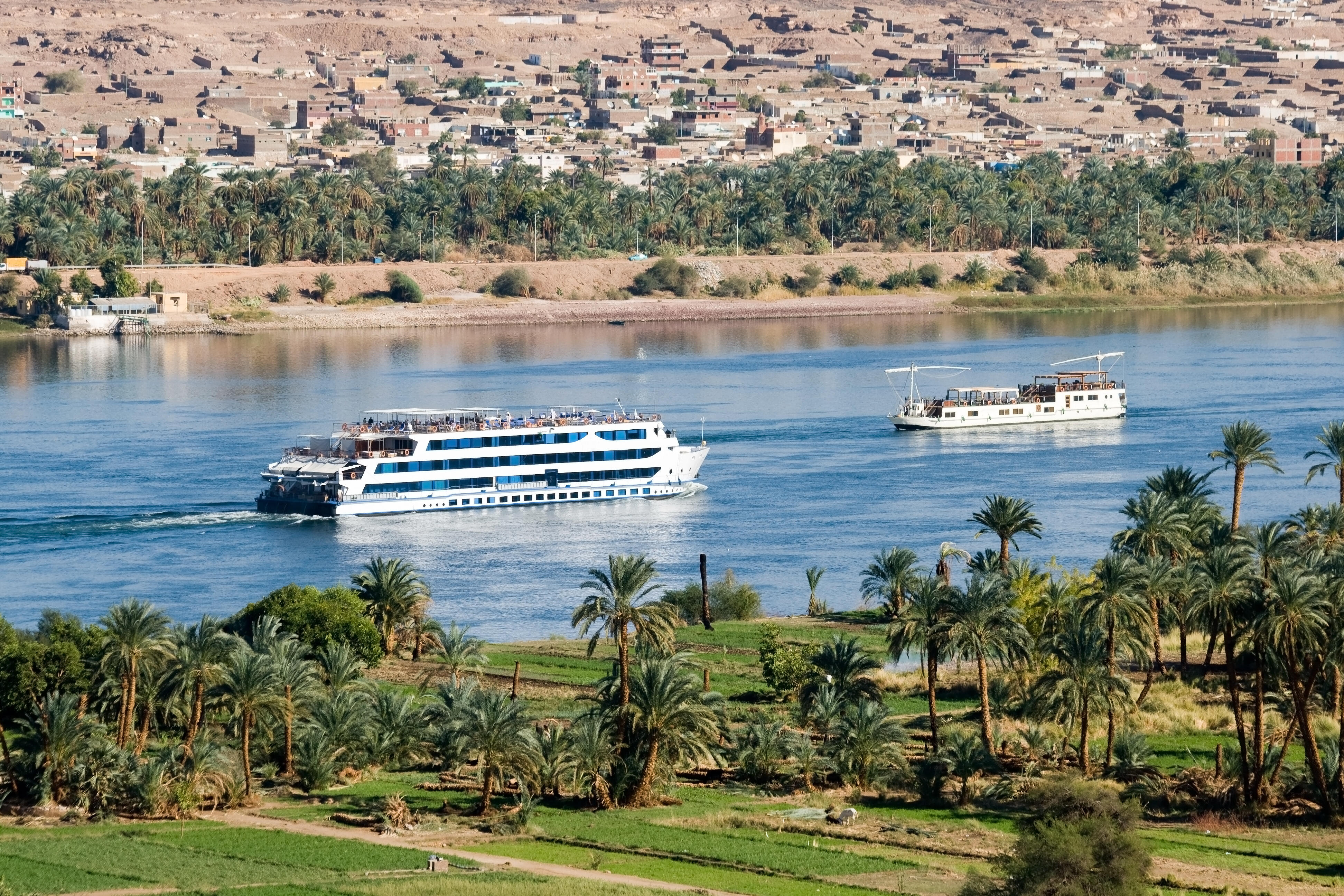 Ancient Egyptian temple ruins seen from a luxury boat on the Nile river